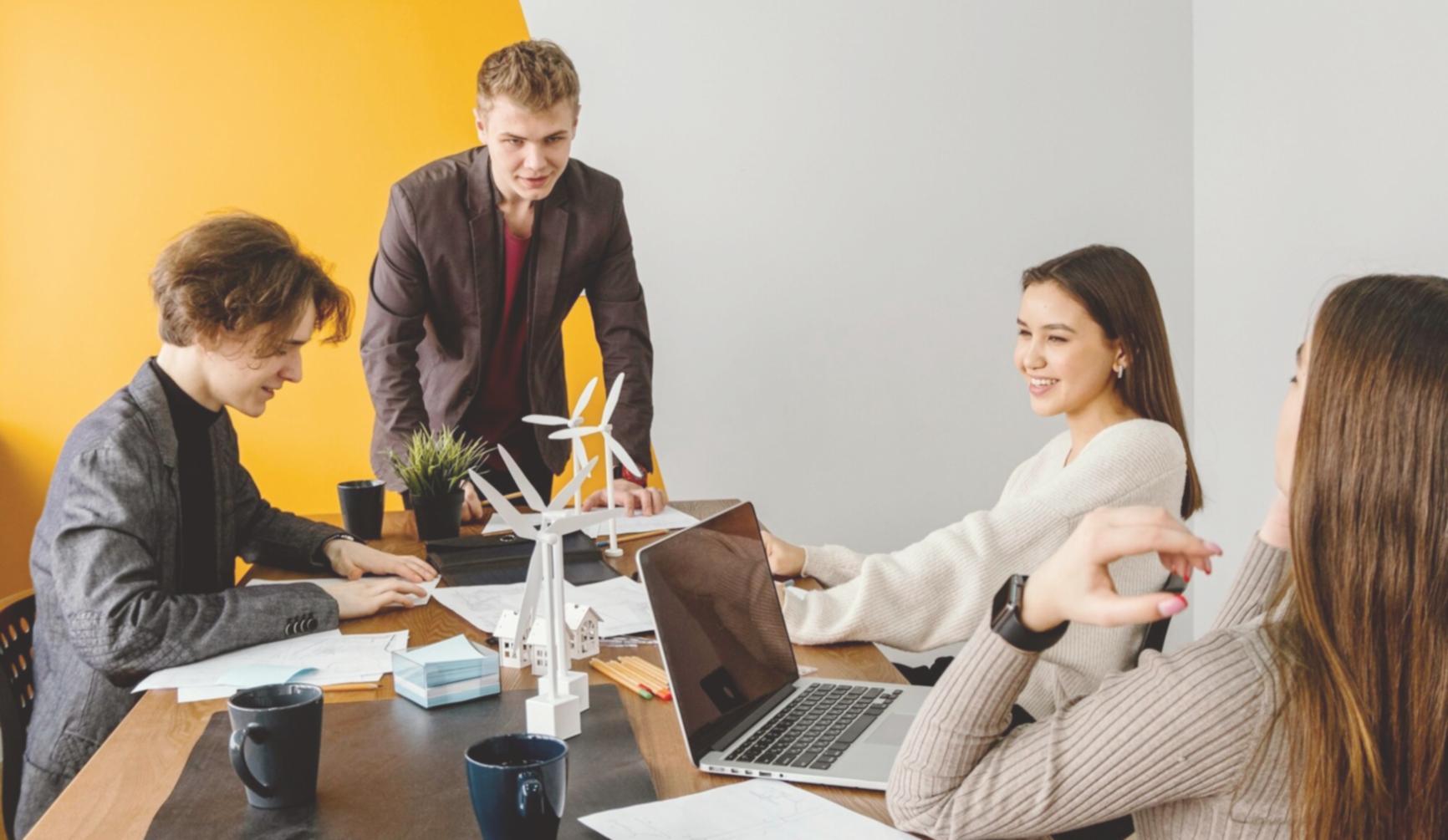 Professional trading analysis workspace showing multiple monitors with technical indicator charts, candlestick patterns, and real-time market data used in our comprehensive trading education program